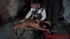 Diabolic doctor waterboards and gropes a naked girl on a bench.