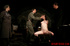 Bare gal tied to a chair gets slapped around by her interrogators.