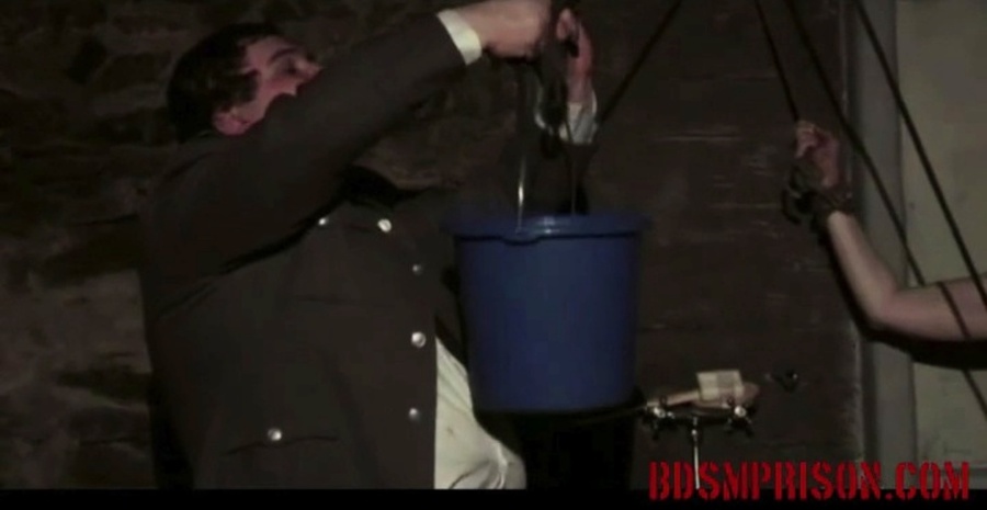 Red-haired honey gets a good scrubbing and then a bucket is suspended while anchored to her cunt. - XXXonXXX - Pic 12