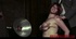 Red-haired sweetie gets her tits taped and faces the heat from a radiant