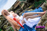 Geek redhead in a nice cosplay stretching her love holes to expose