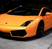 Enticing lady in a black bodysuit shot behind the scenes at the set.