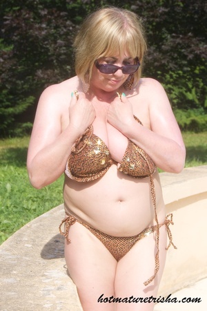 Mature hottie with sunglasses unstrings her sparkling golden brown bikini then displays her fat body with big soggy boobs outdoor. - XXXonXXX - Pic 11