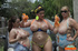 Three seductive big boobs chicks go topless to spray water on tits at