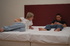 Blonde twink in a white T-shirt opens his back door for a thick dick