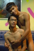 Ponytailed Asian twink in glasses and his friend posing in clothes and