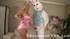 Busty babe in sexy pink bunny outfit sucks a horny dude's cock in white