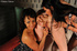 Two tanned brunettes and a slutty redhead are seen having hot lesbian