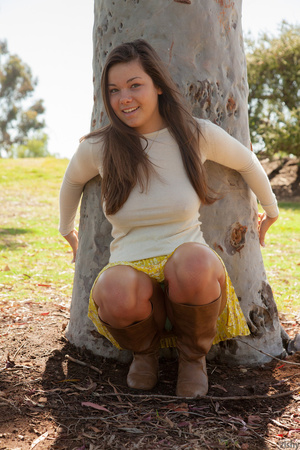 Busty teen brunette in a yellow skirt an - Picture 11