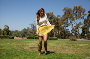 Busty teen brunette in a yellow skirt an - Picture 12