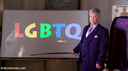 Dude in a purple suit discusses a few things about LGBTQ.
