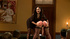 Pack of pervs have some kinky group sex in a room with red drapes.
