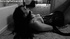 Black and white pics of brunette slave in a corset and fishnet gagged