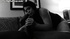 Curvy submissive girl in a black vest giving hand- and blowjob to black