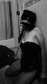 Black stud jeering blindfolded and gagged gal on a dog leash