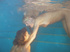 Bitches fucking with double ended dildo dick in the pool in water
