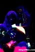Duo of dykes have some lesbian sex toy delights in black light.