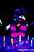 Duo of dykes have some lesbian sex toy delights in black light.