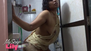 Indian hottie wraps herself with her white and brown shawl then gets her body wet as she takes a shower before she reveals her luscious soft breasts in the bathroom. - Picture 4