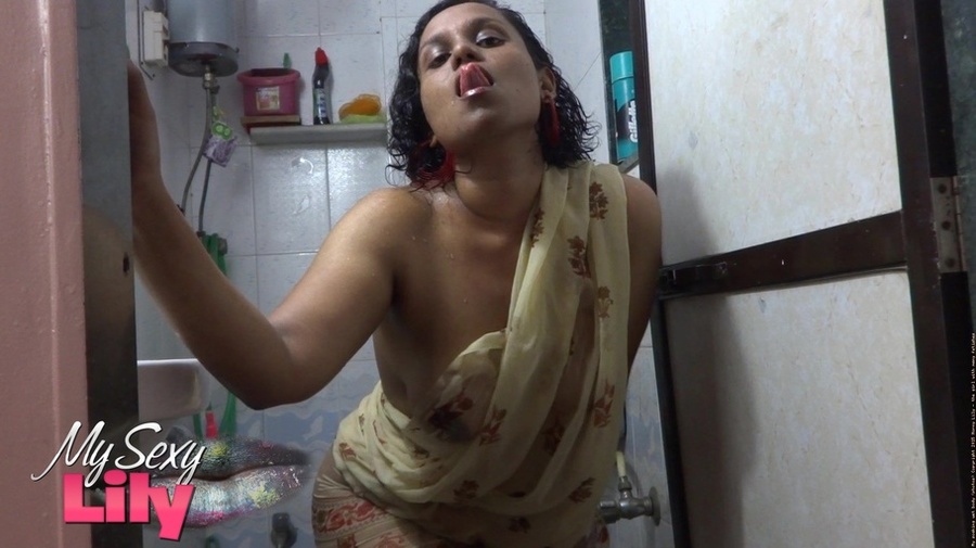 Indian hottie wraps herself with her white and brown shawl then gets her body wet as she takes a shower before she reveals her luscious soft breasts in the bathroom. - XXXonXXX - Pic 6