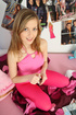 Beautiful young hottie with foxy body pulls up her pink shirt and strips