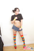 Yellow panties and sea foam bra try to cover gal's goodies