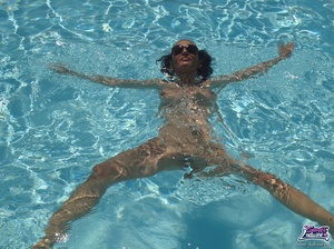 Elegant nude girlie in sunglasses touches her twat at the pool. - XXXonXXX - Pic 5