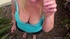 Smoking hot blonde wearing blue shirt pulls down her black shirt then