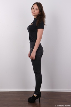 Divine wench in a black top and pants ge - Picture 3