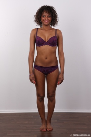 Beautiful ebony-skinned diva in a purple - Picture 7