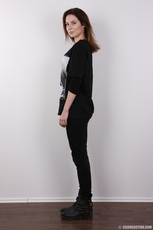 Beguiling cutie in a black shirt, pants  - Picture 3