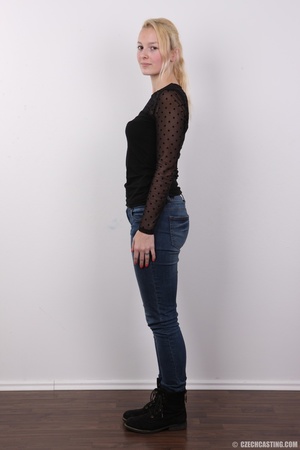 Enchanting madam in a black top and jean - Picture 3