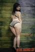 Tied hottie enjoys rough action with ropes and phallus