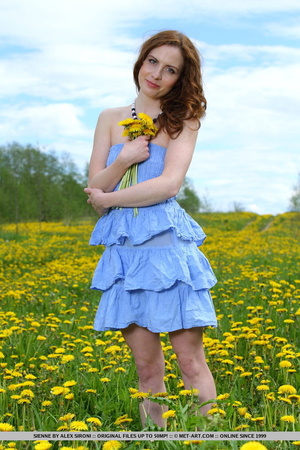 Loose tramp in a frilly blue dress shows - Picture 2