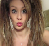 Cute babe wearing pigtails shows her hot ass before she strips off her