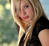 Blonde hottie takes off her sexy black shirt and panty then bares her