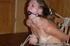 Cutie with gag in her mouth is tied with ropes to the chair
