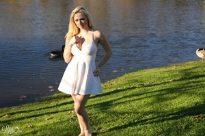 Pretty blonde in lovely white dress pose - Picture 2