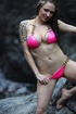 tattooed bombshell displays her