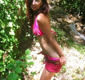Gorgeous hottie strips down her pink shorts then allures with her smoking
