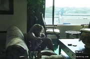 Slutty blonde darling showing her tits and smoking with joy