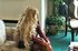 Curly haired blondie shows her pussy and smokes with pleasure