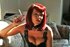 Redhead darling teasing her smooth cunt while smoking