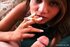She smokes and sucks a pecker in a POV