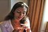Attractive young lady shows her body and smokes with pleasure