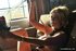 Classy blonde woman showing herself and smoking a nice cigarette