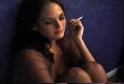 Naughty brunette darling enjoying a nice cigarette