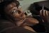 Brunette lady in stockings teasing her cunt and smoking