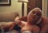 Lovely blonde MILF gets her tits teased while she smokes