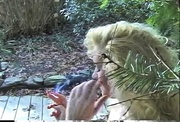 Cute MILF smokes a cigarette outdoors with passion